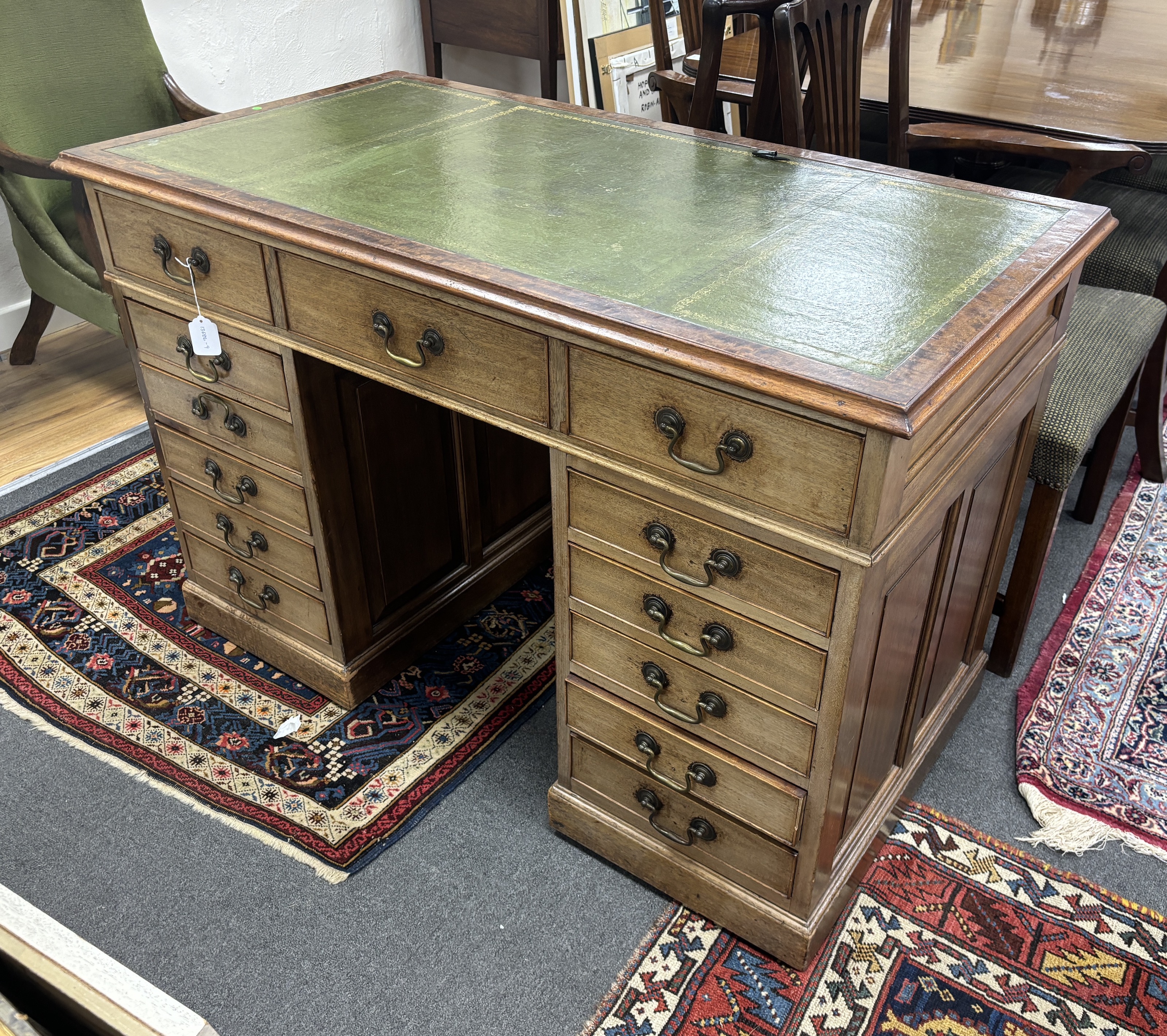 An early 20th century mahogany pedestal desk, width 120cm, depth 65cm, height 80cm